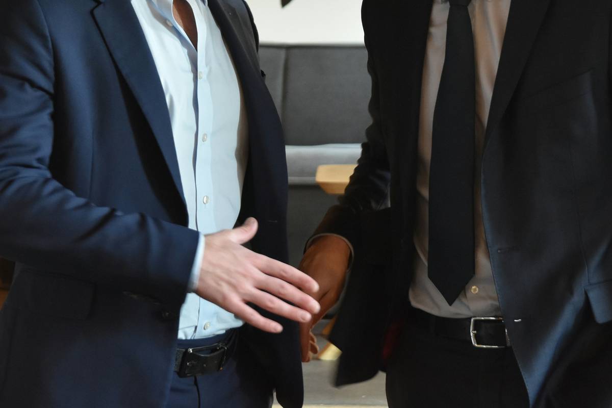 Professional engaging in meaningful conversation at business development networking events