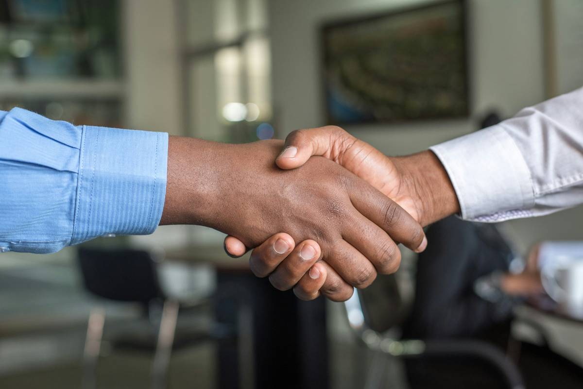 Media professional building social connection networking opportunity through curated email outreach