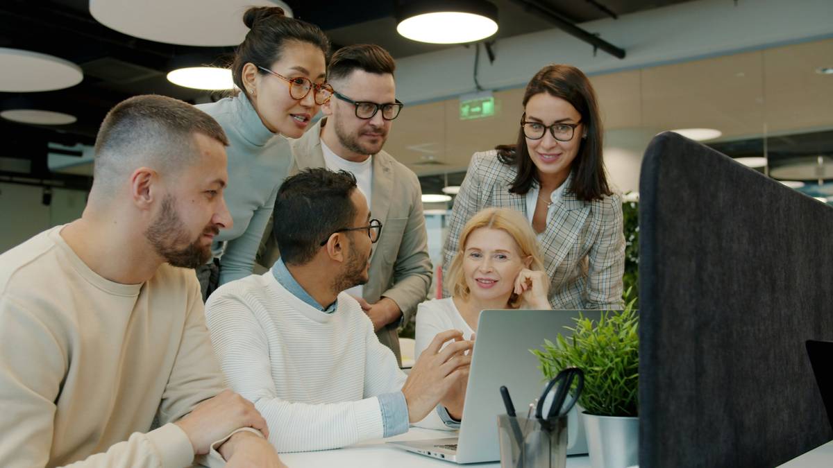 professional social networking illustrated by diverse professionals connecting via laptop and mobile devices in an online education setting